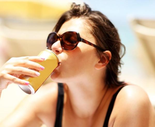 girl drinking beverage