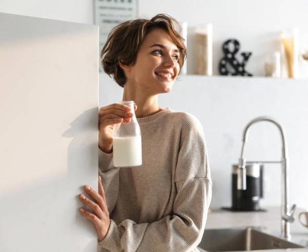 girl holding milk