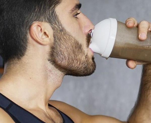 man drinking functional beverage