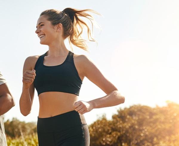 man and woman running 