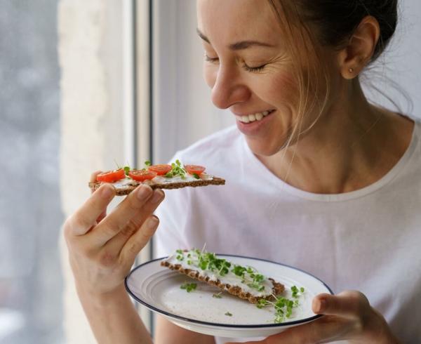 woman eating cheese