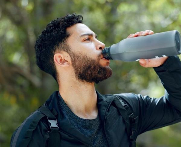 man drinking water