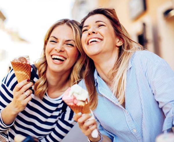 two girls eating ice cream