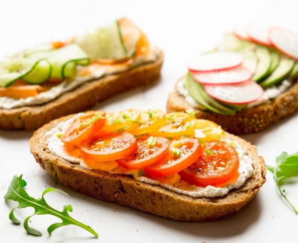 veggies and cream cheese on bread