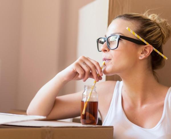 woman drinking beverage