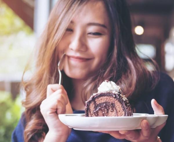 woman eating cake