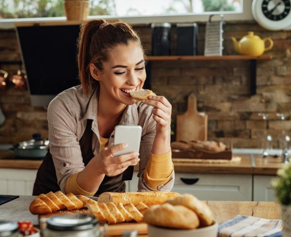 woman eating bread