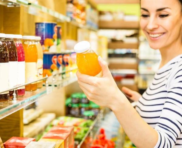 woman looking at juice