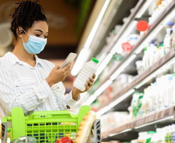 woman looking at milk