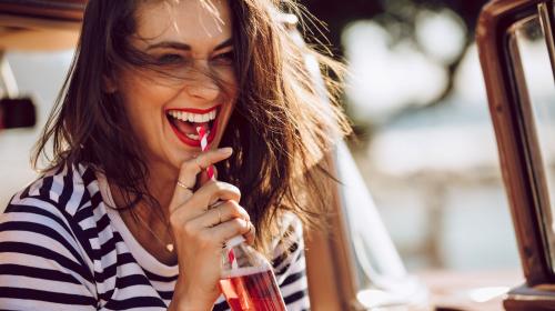 woman drinking beverage